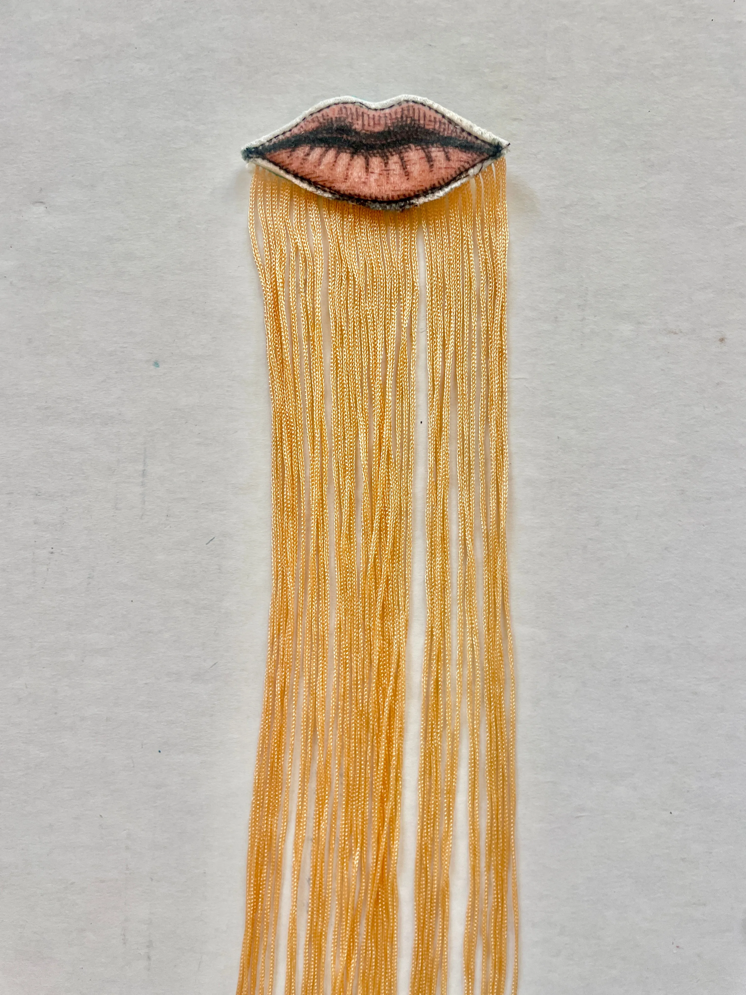 Lip Brooch